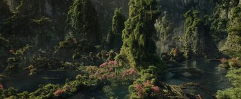 Movie still from “Maleficent: Mistress of Evil” (2019), directed by Joachim Rønning – An image of an island in the middle of a forest; Extreme Wide shot, High angle