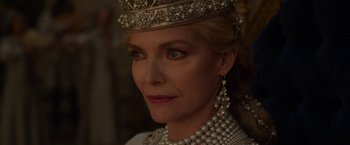 Movie still from “Maleficent: Mistress of Evil” (2019), directed by Joachim Rønning – A person wearing a crown; Close Up shot, Over the shoulder angle