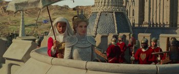 Movie still from “Maleficent: Mistress of Evil” (2019), directed by Joachim Rønning – Two women dressed in medieval clothing and one woman is holding a sword; Medium shot, Over the shoulder angle