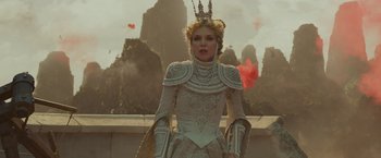 Movie still from “Maleficent: Mistress of Evil” (2019), directed by Joachim Rønning – A woman in a white dress with a crown on her head; Medium shot, Low angle