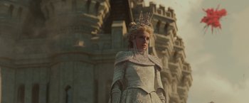 Movie still from “Maleficent: Mistress of Evil” (2019), directed by Joachim Rønning – A woman in a white dress and a crown; Medium shot, Low angle