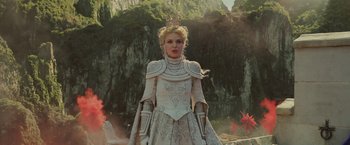 Movie still from “Maleficent: Mistress of Evil” (2019), directed by Joachim Rønning – A woman dressed as a princess in a white dress; Medium shot, Low angle