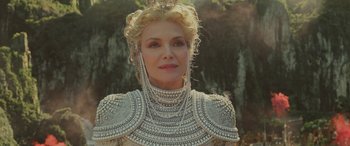 Movie still from “Maleficent: Mistress of Evil” (2019), directed by Joachim Rønning – A person wearing a dress; Close Up shot, Over the shoulder angle