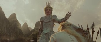 Movie still from “Maleficent: Mistress of Evil” (2019), directed by Joachim Rønning – A woman dressed as a princess in a white dress; Medium shot, Low angle
