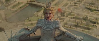 Movie still from “Maleficent: Mistress of Evil” (2019), directed by Joachim Rønning – A woman dressed as a princess with a crown on her head; Medium shot, Low angle