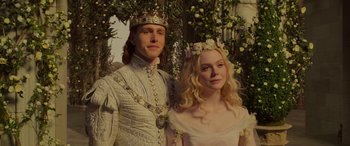 Movie still from “Maleficent: Mistress of Evil” (2019), directed by Joachim Rønning – A man and a woman dressed as a king and a princess; Close Up shot, Low angle