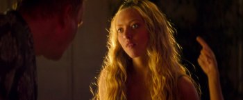 Movie still from “Mamma Mia!” (2008), directed by Phyllida Lloyd – A woman with long blonde hair looking into a mirror; Close Up shot, Over the shoulder angle