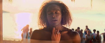 Movie still from “Mamma Mia!” (2008), directed by Phyllida Lloyd – A man with his eyes closed and his hands clasped together; Close Up shot, Low angle