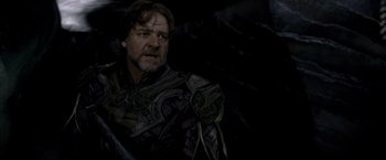 Movie still from “Man of Steel” (2013), directed by Zack Snyder – A person with a sword; Medium shot, Over the shoulder angle