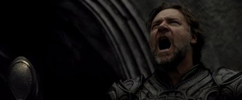 Movie still from “Man of Steel” (2013), directed by Zack Snyder – A person with his mouth wide open; Close Up shot, Low angle