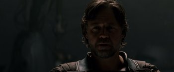 Movie still from “Man of Steel” (2013), directed by Zack Snyder – A person with a beard; Close Up shot, Low angle