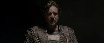 Movie still from “Man of Steel” (2013), directed by Zack Snyder – A person wearing a jacket; Close Up shot, Over the shoulder angle