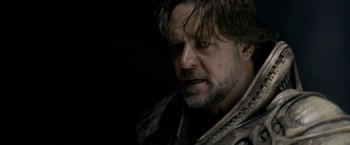 Movie still from “Man of Steel” (2013), directed by Zack Snyder – A person with wet hair; Close Up shot, Over the shoulder angle