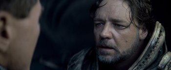 Movie still from “Man of Steel” (2013), directed by Zack Snyder – A person with a beard; Close Up shot, Over the shoulder angle