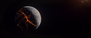 Movie still from “Man of Steel” (2013), directed by Zack Snyder – An image of an image of the earth in the dark; Extreme Wide shot, High angle