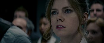 Movie still from “Man of Steel” (2013), directed by Zack Snyder – A person with blue eyes; Close Up shot, Over the shoulder angle