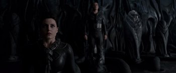 Movie still from “Man of Steel” (2013), directed by Zack Snyder – A man and a woman are standing next to each other; Medium shot, Over the shoulder angle