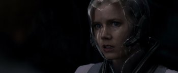 Movie still from “Man of Steel” (2013), directed by Zack Snyder – A person wearing a helmet; Close Up shot, Over the shoulder angle