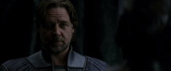 Movie still from “Man of Steel” (2013), directed by Zack Snyder – A person with a beard; Close Up shot, Over the shoulder angle