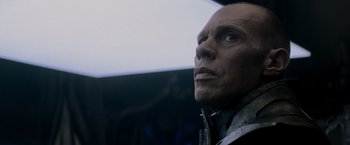 Movie still from “Man of Steel” (2013), directed by Zack Snyder – A person looking up at the sky; Close Up shot, Low angle