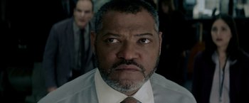 Movie still from “Man of Steel” (2013), directed by Zack Snyder – A man that is staring at the camera; Close Up shot, Low angle