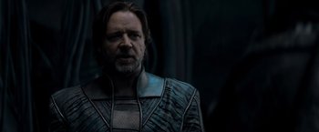 Movie still from “Man of Steel” (2013), directed by Zack Snyder – A person wearing a suit; Close Up shot, Over the shoulder angle