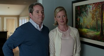 Movie still from “Manchester by the Sea” (2016), directed by Kenneth Lonergan – A man and a woman standing next to each other; Medium shot, Low angle