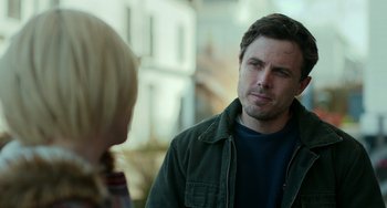 Movie still from “Manchester by the Sea” (2016), directed by Kenneth Lonergan – A man and a woman talking to each other; Close Up shot, Over the shoulder angle
