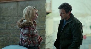 Movie still from “Manchester by the Sea” (2016), directed by Kenneth Lonergan – A man and a woman talking to each other outside; Medium shot, Over the shoulder angle