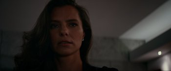 Movie still from “Margaux” (2022), directed by Steven C. Miller – A person looking at the camera; Close Up shot, Low angle