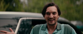 Movie still from “Margaux” (2022), directed by Steven C. Miller – A person with long hair; Close Up shot, Over the shoulder angle