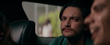 Movie still from “Margaux” (2022), directed by Steven C. Miller – A person sitting in a car; Close Up shot, Over the shoulder angle
