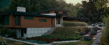 Movie still from “Margaux” (2022), directed by Steven C. Miller – A house that has a lot of grass in front of it; Extreme Wide shot, High angle