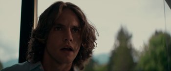 Movie still from “Margaux” (2022), directed by Steven C. Miller – A person with long brown hair; Close Up shot, Low angle