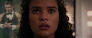 Movie still from “Margaux” (2022), directed by Steven C. Miller – A woman's face with brown eyes; Close Up shot, Low angle