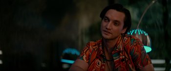 Movie still from “Margaux” (2022), directed by Steven C. Miller – A person wearing an orange shirt; Close Up shot, Over the shoulder angle