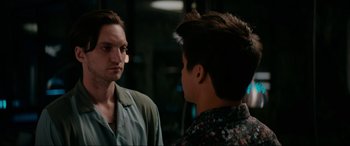 Movie still from “Margaux” (2022), directed by Steven C. Miller – A man and a boy looking at one another in a mirror; Close Up shot, Over the shoulder angle