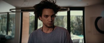 Movie still from “Margaux” (2022), directed by Steven C. Miller – A person with long black hair; Close Up shot, Low angle