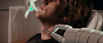 Movie still from “Margaux” (2022), directed by Steven C. Miller – A man getting his teeth cleaned by a dentist; Close Up shot, Low angle