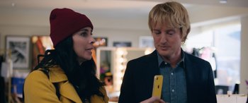 Movie still from “Marry Me” (2022), directed by Kat Coiro – A man and a woman looking at an iphone; Close Up shot, Over the shoulder angle
