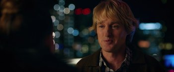 Movie still from “Marry Me” (2022), directed by Kat Coiro – A person wearing a jacket; Close Up shot, Over the shoulder angle