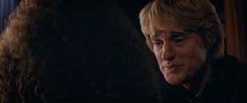 Movie still from “Marry Me” (2022), directed by Kat Coiro – A person with blonde hair; Close Up shot, Over the shoulder angle