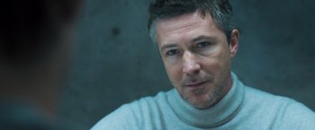 Movie still from “Maze Runner: The Scorch Trials” (2015), directed by Wes Ball – A person wearing a white sweater; Close Up shot, Low angle