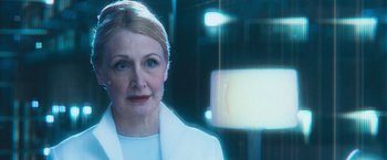 Movie still from “Maze Runner: The Scorch Trials” (2015), directed by Wes Ball – A person wearing a lab coat; Close Up shot, Over the shoulder angle