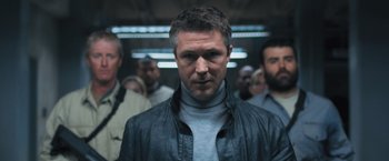 Movie still from “Maze Runner: The Scorch Trials” (2015), directed by Wes Ball – A person with a crowd of people; Close Up shot, Low angle