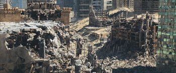 Movie still from “Maze Runner: The Scorch Trials” (2015), directed by Wes Ball – A large pile of rubble in the middle of a city; Extreme Wide shot, High angle