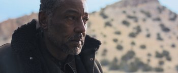 Movie still from “Maze Runner: The Scorch Trials” (2015), directed by Wes Ball – A person wearing a jacket; Close Up shot, Low angle