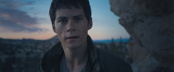 Movie still from “Maze Runner: The Scorch Trials” (2015), directed by Wes Ball – A young man is looking into the distance; Close Up shot, Low angle