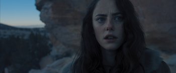 Movie still from “Maze Runner: The Scorch Trials” (2015), directed by Wes Ball – A person with long dark hair; Close Up shot, Over the shoulder angle