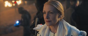 Movie still from “Maze Runner: The Scorch Trials” (2015), directed by Wes Ball – A person wearing a white jacket; Close Up shot, Over the shoulder angle